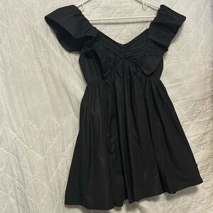 black dress with pockets.